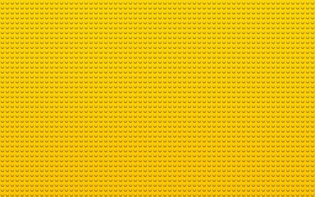 a yellow background with small dots
